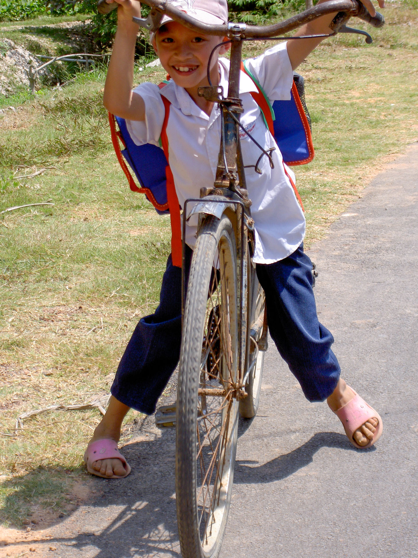 Vietnam-Fahrrad-Kinderlachen Vietnam-Fahrrad-Kinderlachen